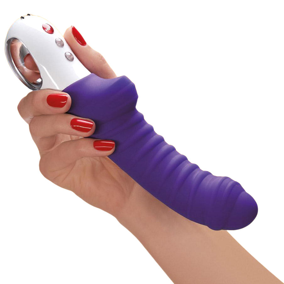 person holding the fun factory tiger g-spot vibrator violet