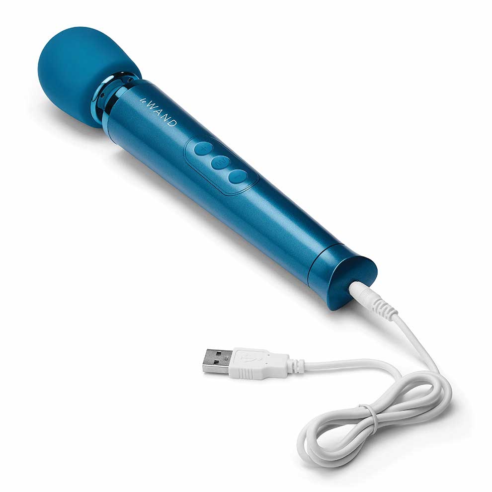 close-up of the charging of the le wand petite rechargeable massager lw-007blu blue