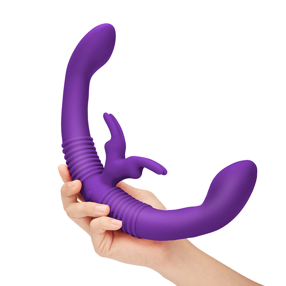 person holding the together couples' double-ended responsive vibrator with remote control couples purple