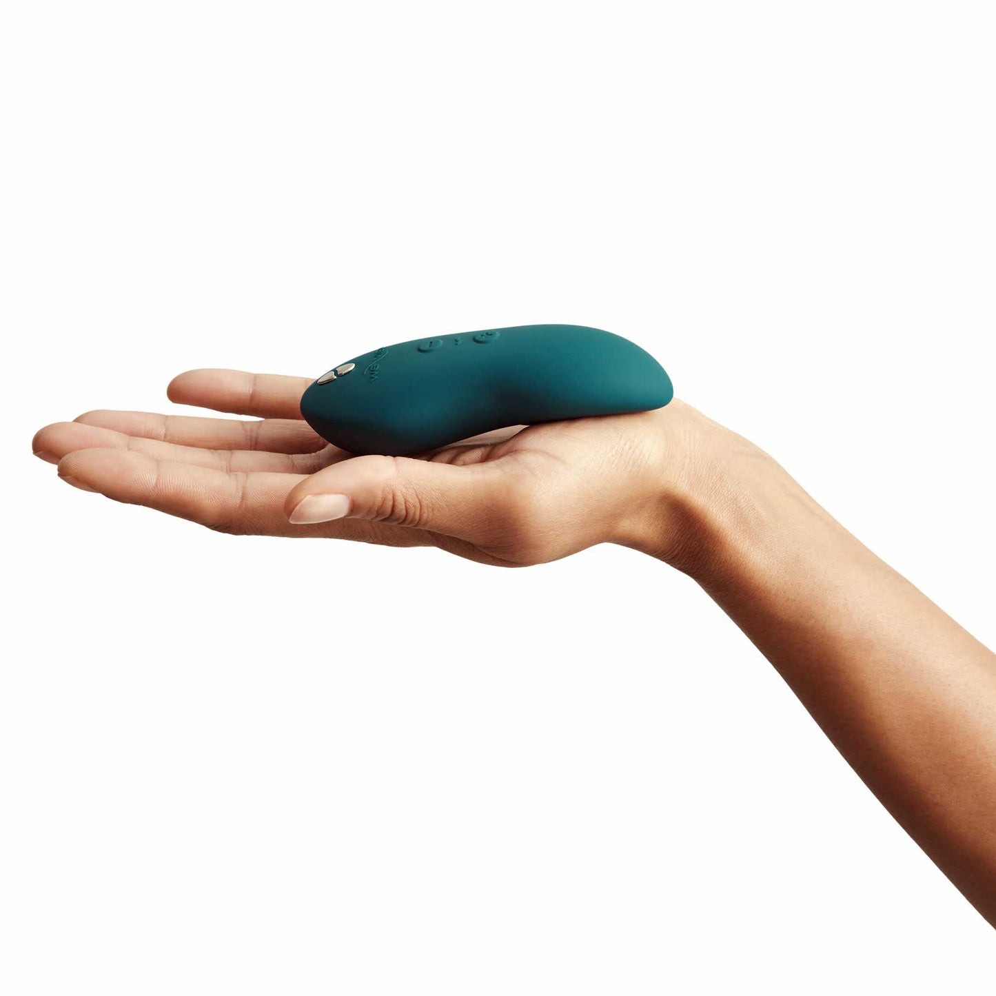 a person's hand to reference the size of the we-vibe touch x powerful mini massager wvsntcsg6 green velvet